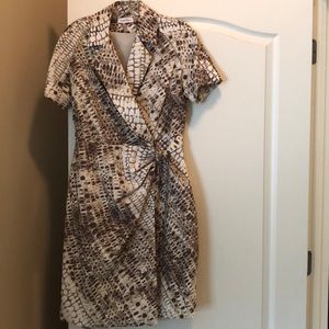 Calvin Klein cream and brown front closure dress.